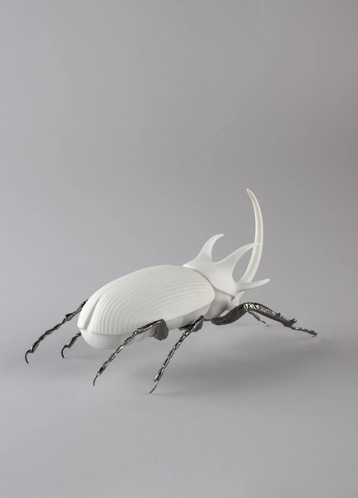 Lladro Rhinoceros Beetle Figurine. Matte White