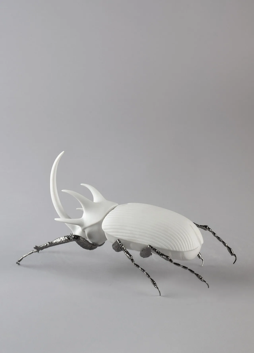 Lladro Rhinoceros Beetle Figurine. Matte White