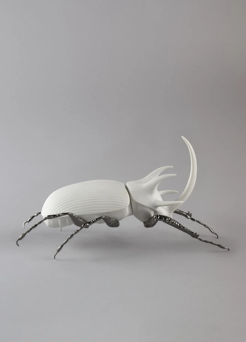 Lladro Rhinoceros Beetle Figurine. Matte White